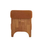 Fauteuil d'appoint en bouclé et hévéa avec dossier roulé