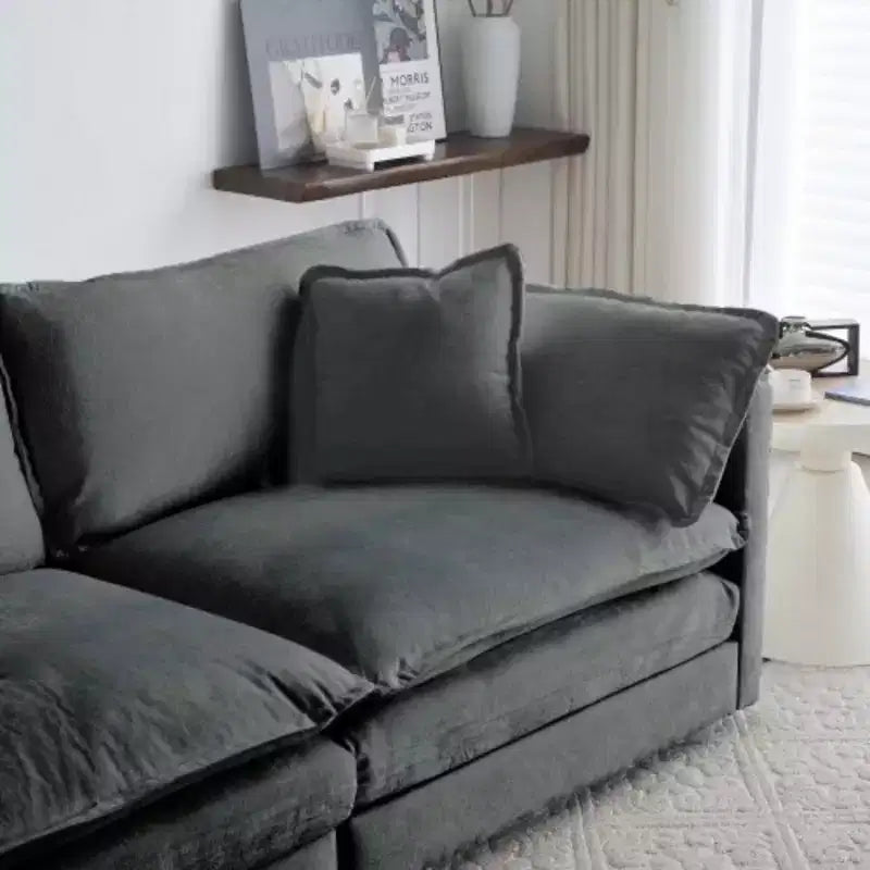 Canapé d'angle modulable : méridienne réversible, double ottoman et confort suprême