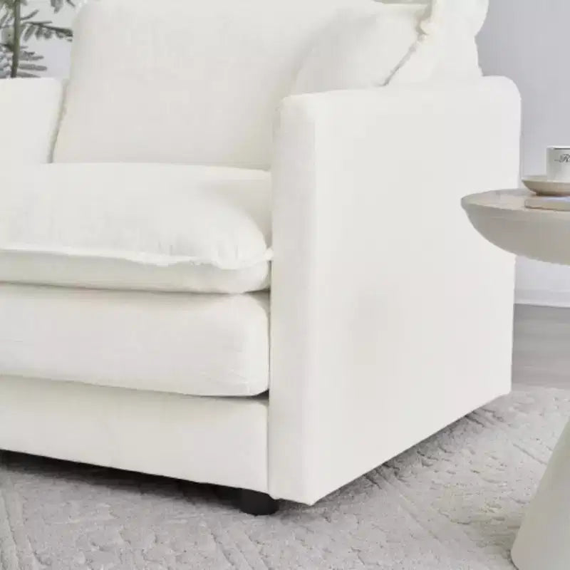 Canapé d'angle modulable : méridienne réversible, double ottoman et confort suprême