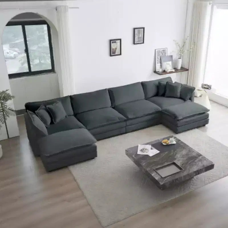 Canapé d'angle modulable : méridienne réversible, double ottoman et confort suprême